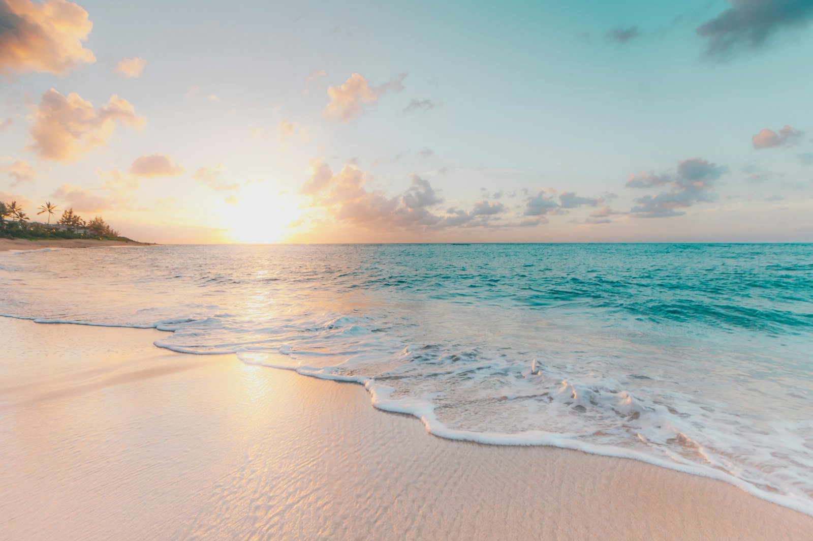 Tropical sunset over the water